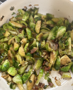 Cooked brussels sprouts in a pan.