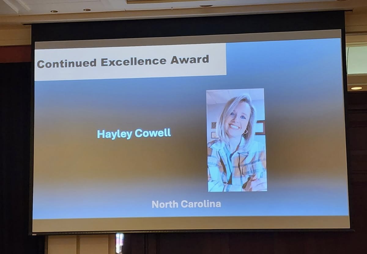 picture of fcs agent hayley cowell being awarded the continued excellence award for north carolina by the national extension association of family and consumer sciences